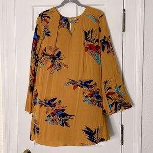 Umber Yellow Floral dress with long bell sleeves. Size Medium
